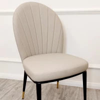 Cleo Leather Dining Chair – Soft Curves, Lasting Elegance